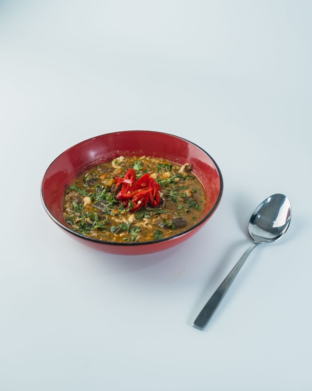 Egusi soup — melon seed and spinach soup, served with pounded yam.