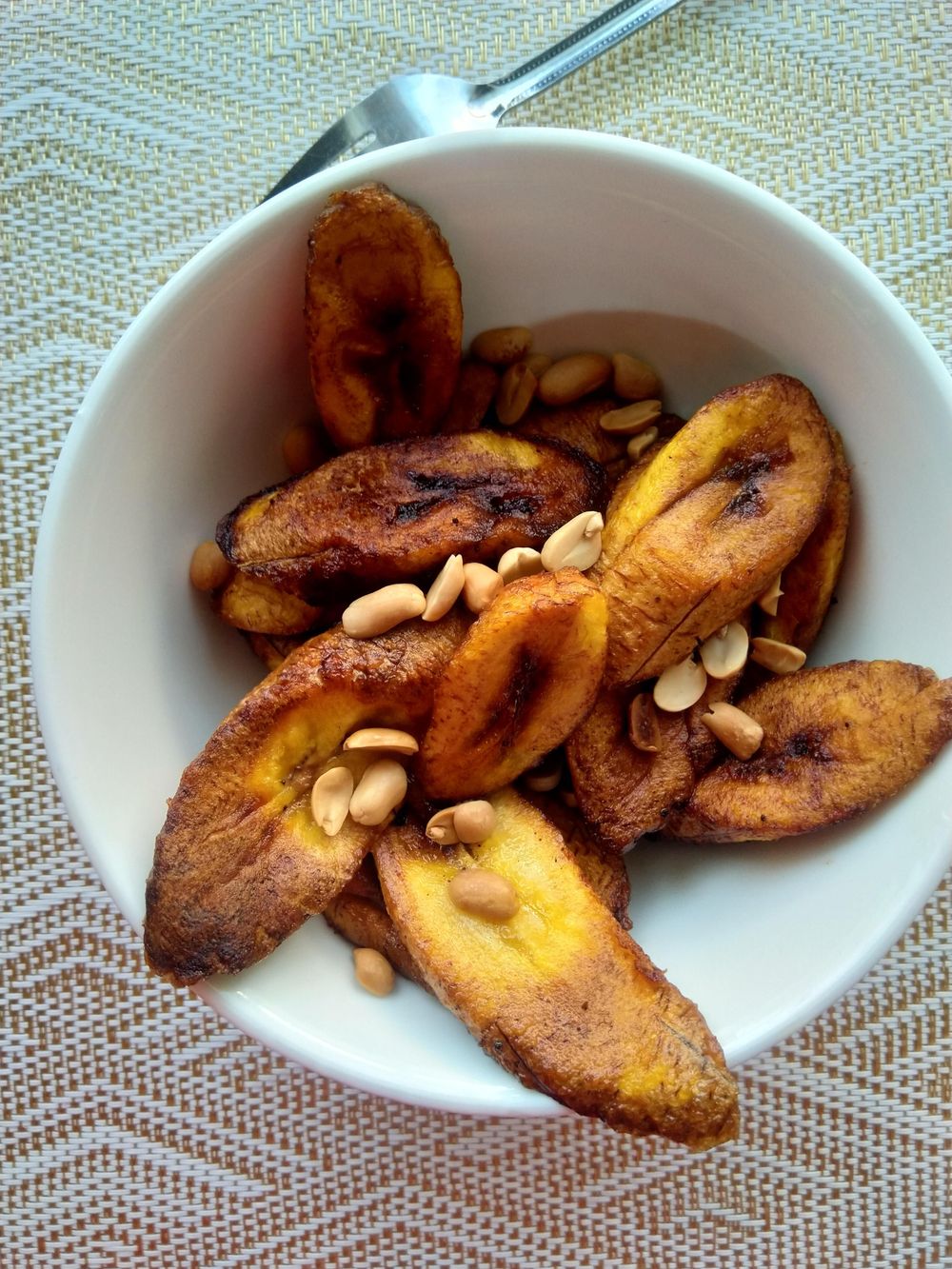 Asun, grilled spicy goat meat.